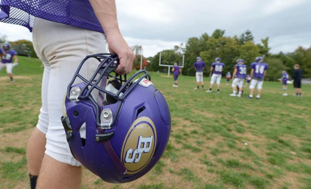 How much does a football helmet weigh